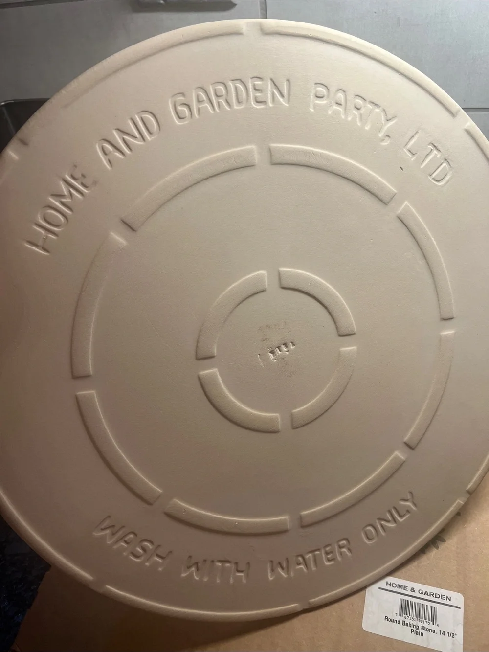 Home & Garden Party 14 1/2” new in box round pizza stone.